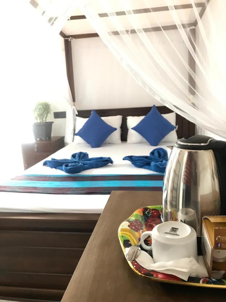 Bisandu Guesthouse Мирисса Номер фото